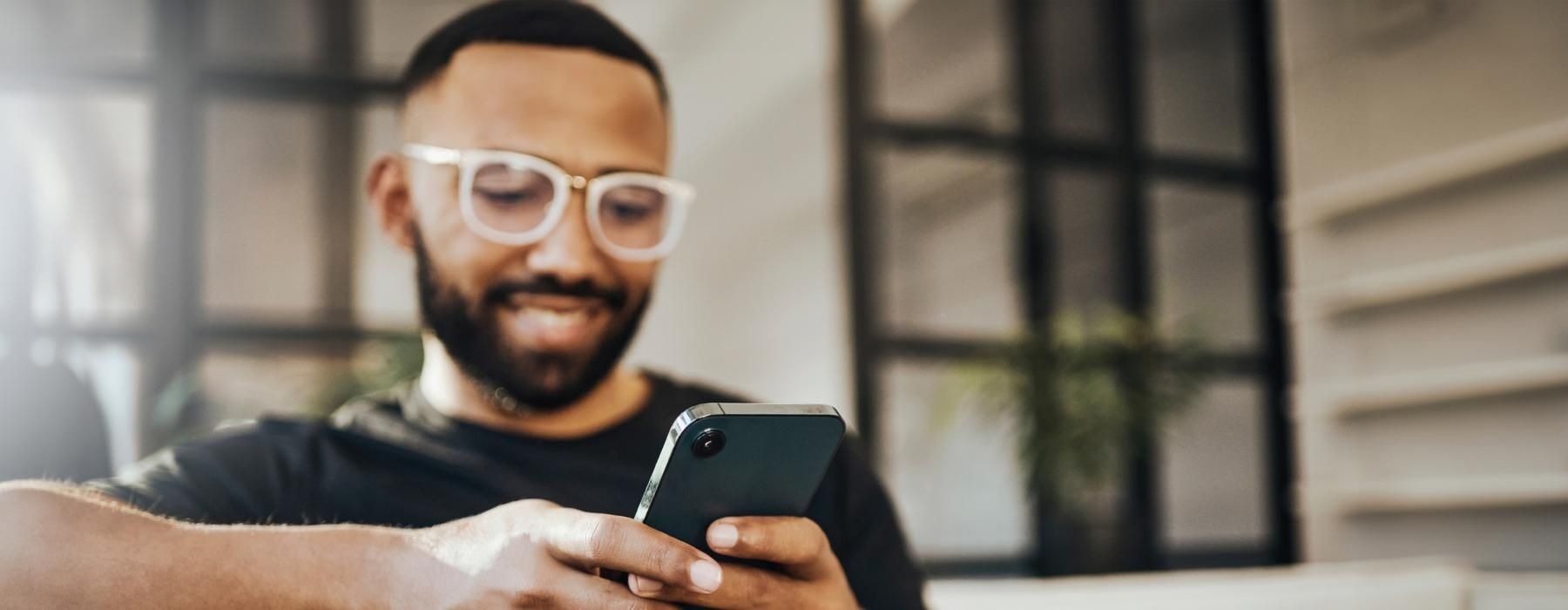 a man holding a phone