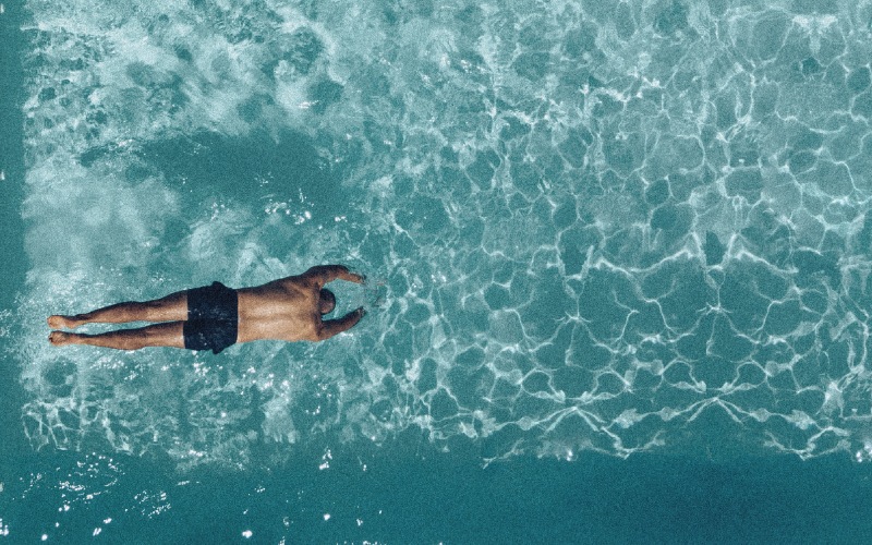 a person swimming in the ocean