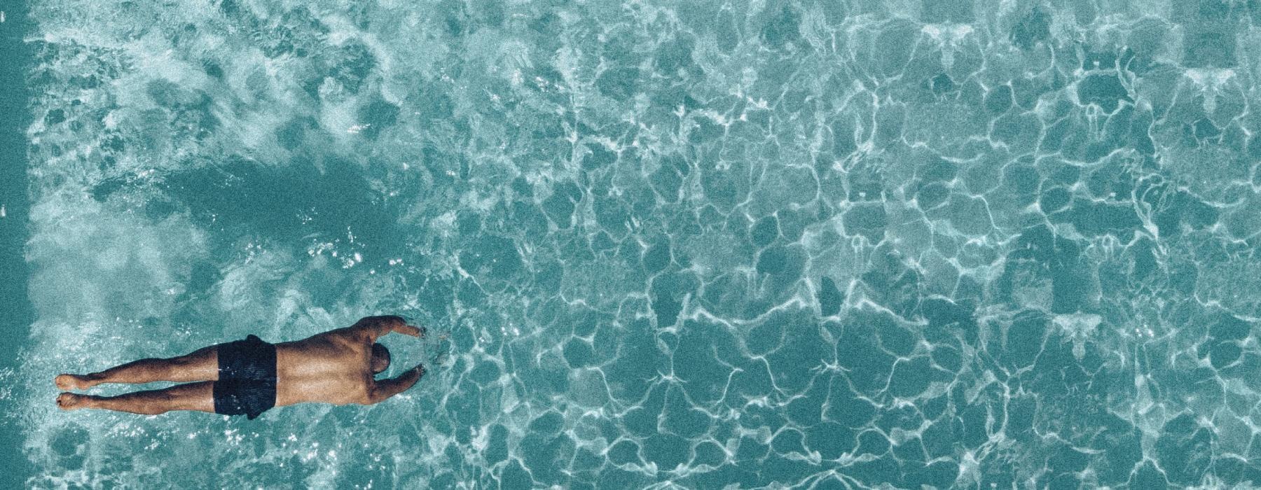 a person swimming in the ocean